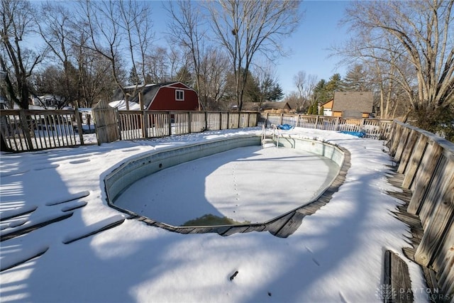 view of snow covered pool