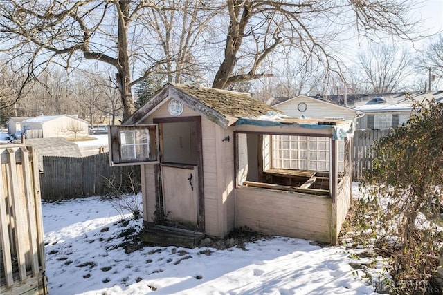 view of snow covered property