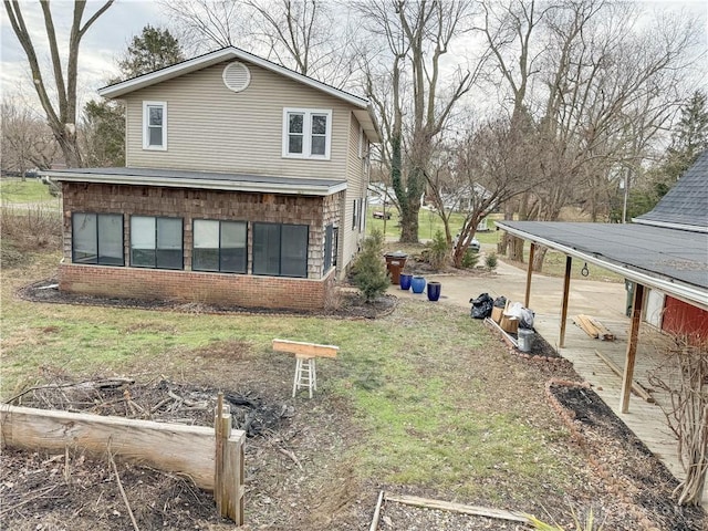 view of home's exterior with a lawn