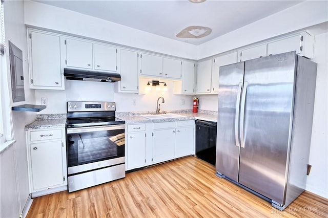 kitchen with sink, light wood-type flooring, and appliances with stainless steel finishes