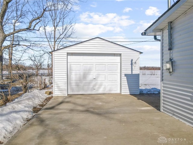 view of snow covered garage