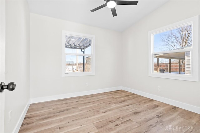 unfurnished room featuring ceiling fan and light wood-type flooring