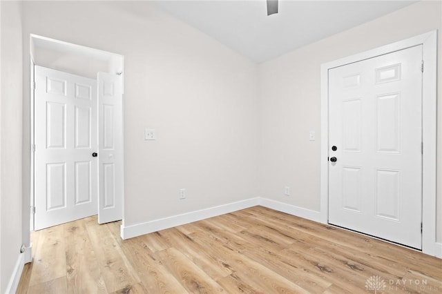 spare room featuring light hardwood / wood-style floors