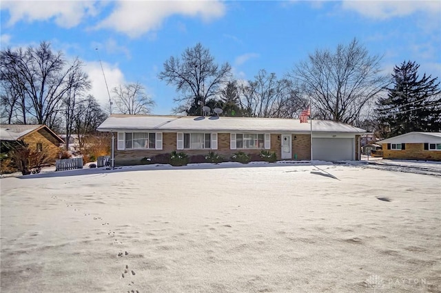 single story home featuring a garage