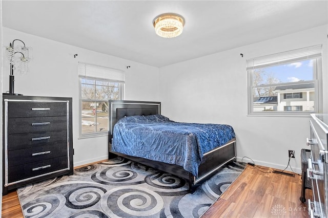 bedroom featuring hardwood / wood-style floors