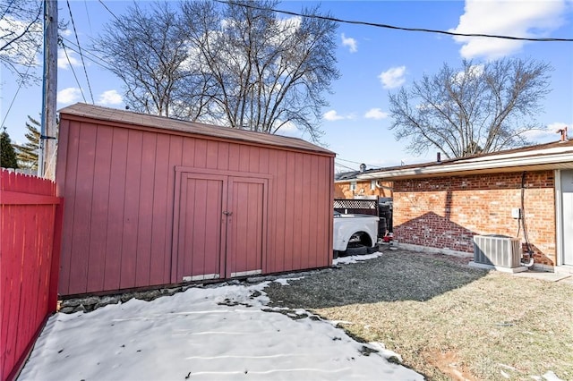 view of outdoor structure with central AC unit