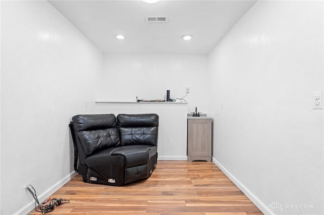 living area featuring light hardwood / wood-style flooring