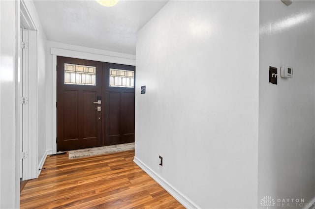 foyer entrance featuring hardwood / wood-style flooring