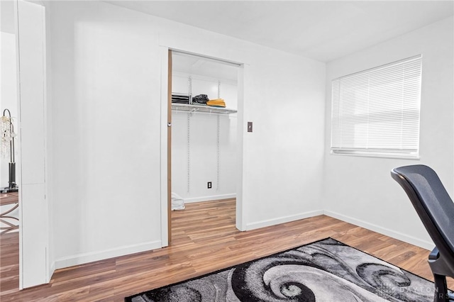 home office featuring hardwood / wood-style flooring