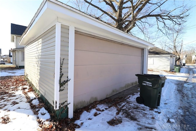 view of snow covered garage