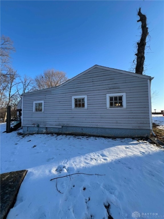 view of snow covered property