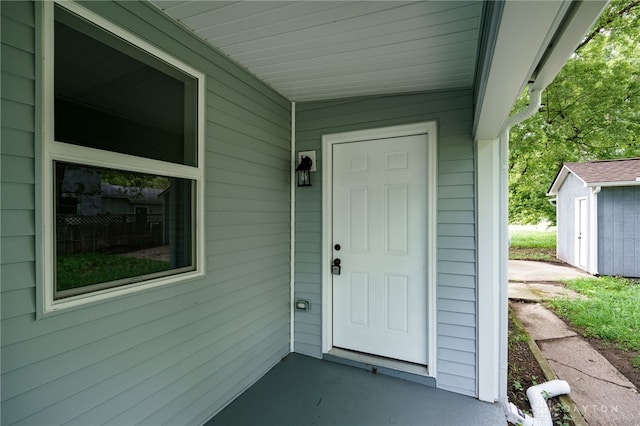 doorway to property with a porch