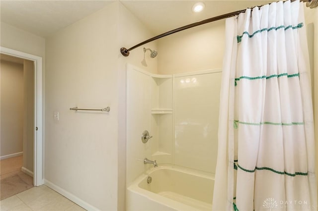 bathroom featuring shower / tub combo with curtain