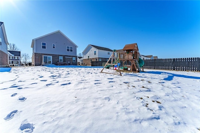 view of snow covered playground