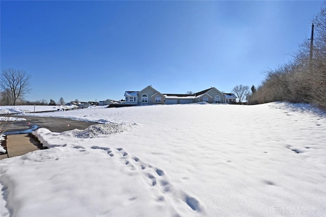 view of snowy yard