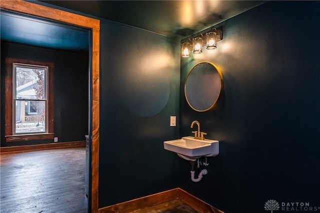 bathroom with sink and hardwood / wood-style floors