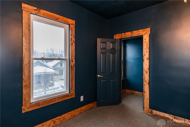 hallway featuring carpet floors