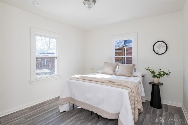 bedroom featuring dark hardwood / wood-style flooring