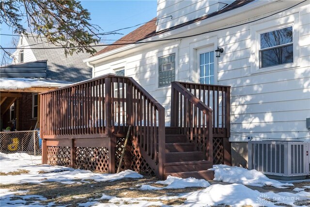 snow covered deck with cooling unit