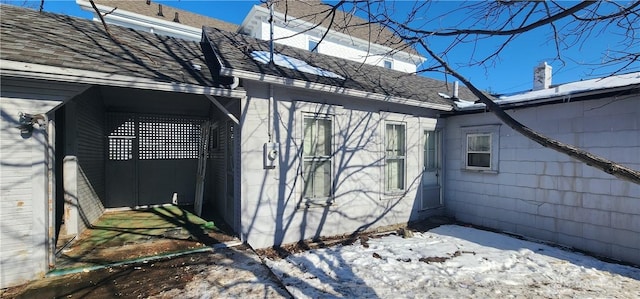 view of property exterior featuring a carport