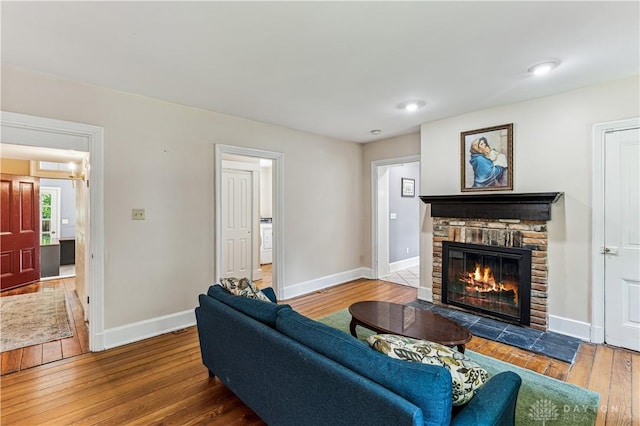 1311 US Route 50, Miami Township, OH 45150 - living room with hardwood / wood-style floors, baseboards, and a fireplace