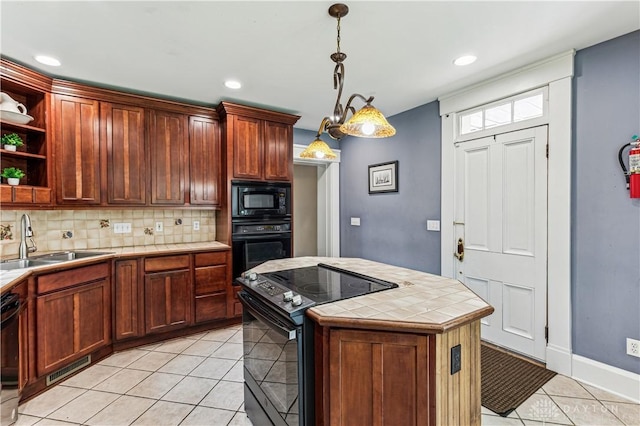 1311 US Route 50, Miami Township, OH 45150 - kitchen with black appliances, a sink, tile countertops, open shelves, and light tile patterned flooring