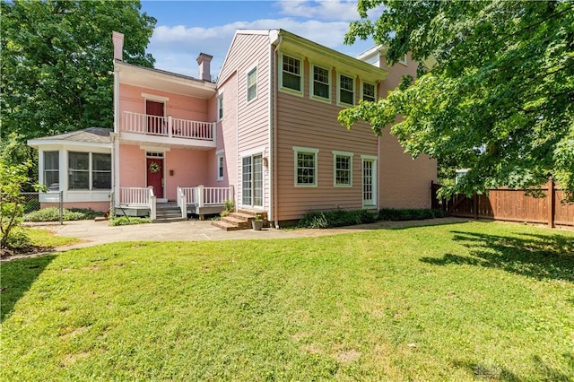 1311 US Route 50, Miami Township, OH 45150 - rear view of house with a patio, a balcony, and a wooden deck