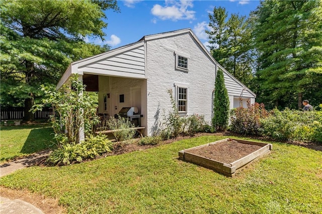 1311 US Route 50, Miami Township, OH 45150 - view of side of home with a garden