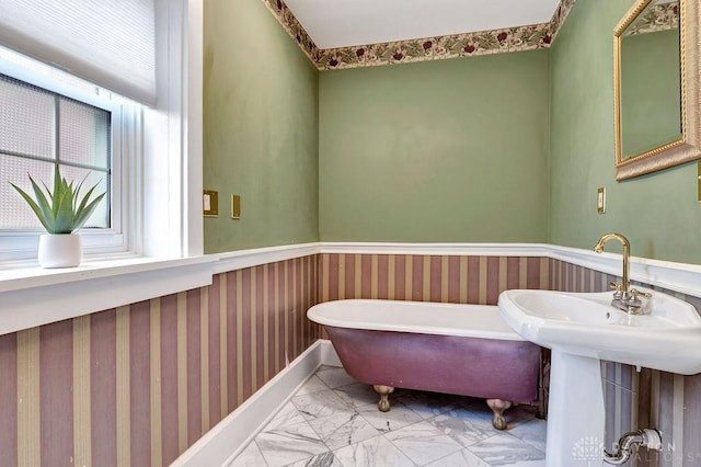 1311 US Route 50, Miami Township, OH 45150 - full bath featuring a freestanding bath and marble look tiles