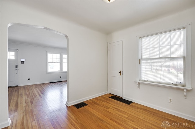 entrance foyer featuring hardwood / wood-style flooring