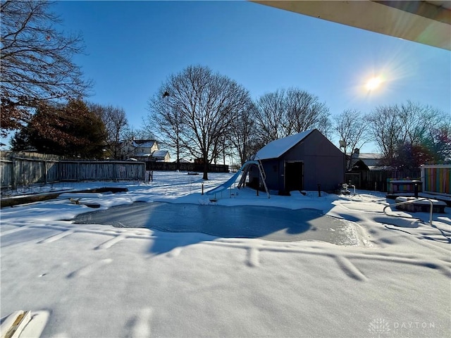 view of snow covered pool