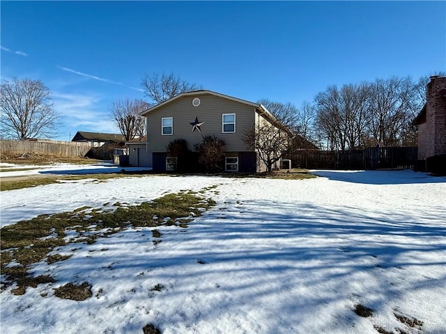 view of snow covered property