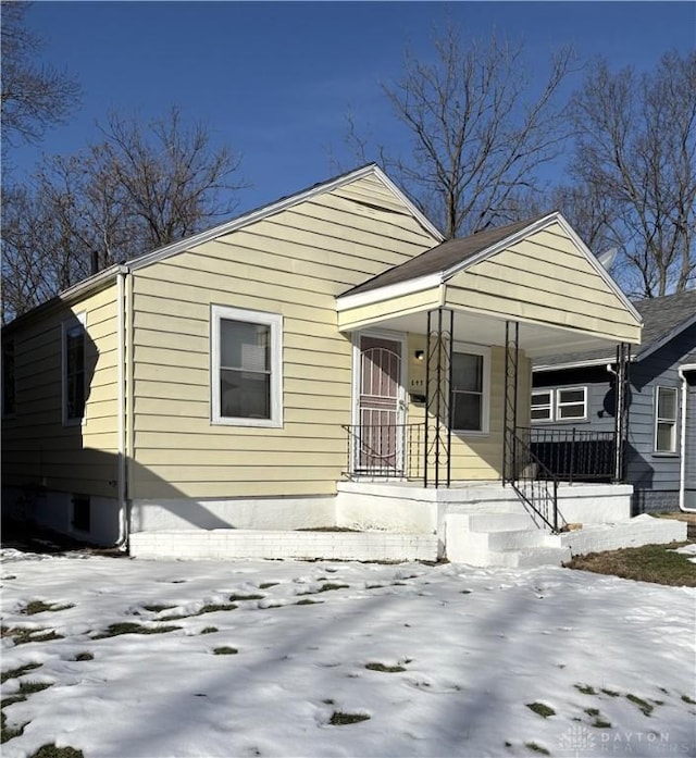 bungalow-style home with a porch