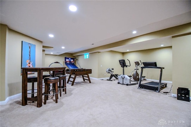 exercise room featuring carpet