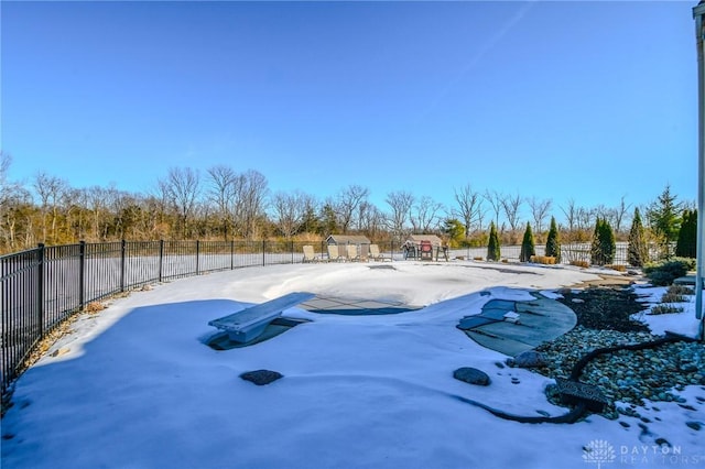 view of yard layered in snow