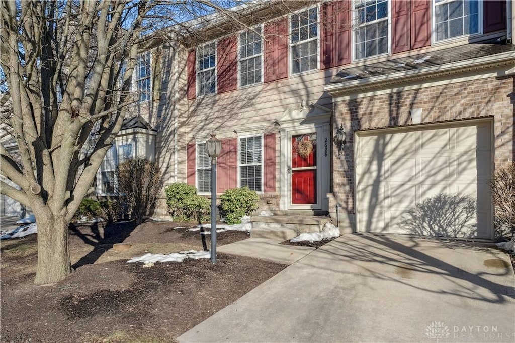 view of front of property with a garage