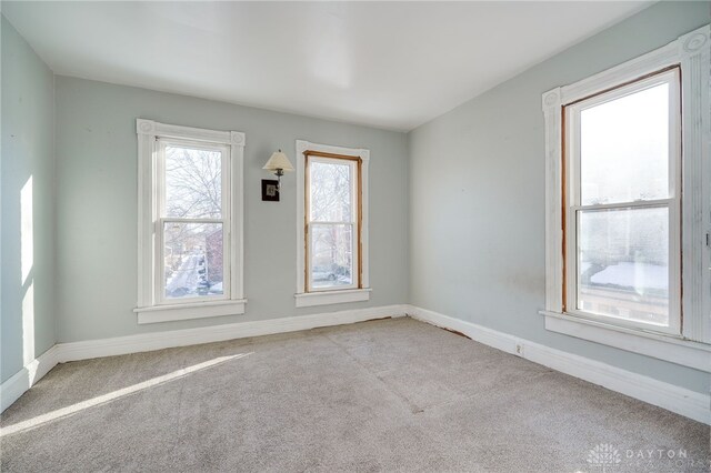 view of carpeted spare room