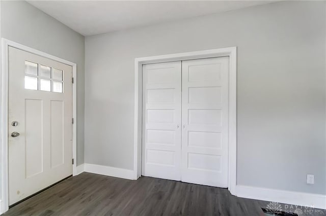 entrance foyer with dark hardwood / wood-style flooring