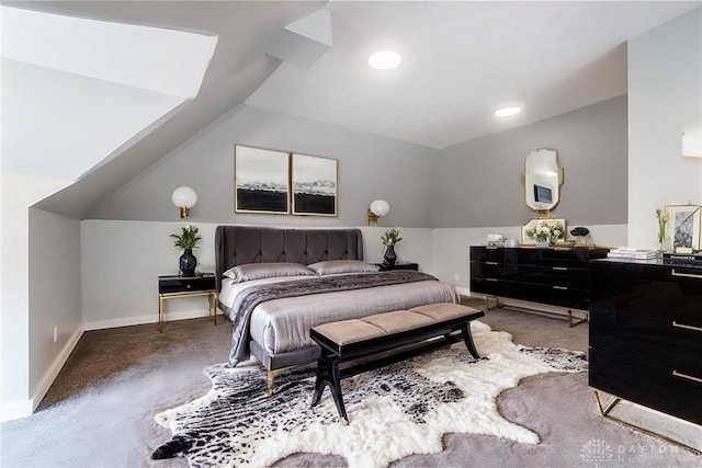 carpeted bedroom featuring vaulted ceiling