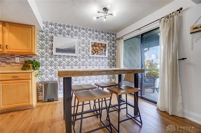 dining room with light hardwood / wood-style flooring