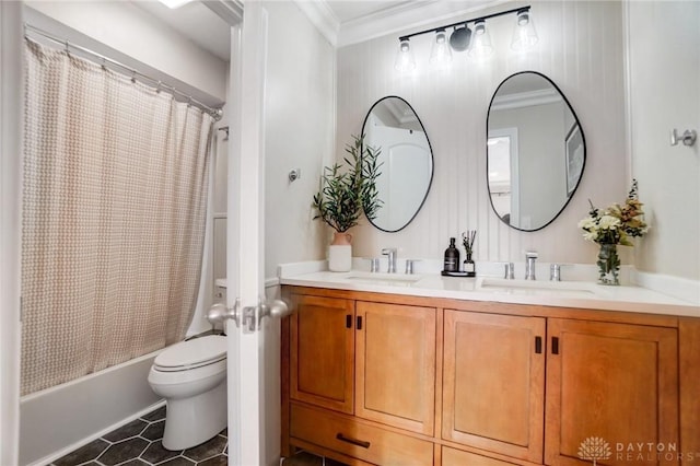 full bathroom with crown molding, tile patterned flooring, vanity, shower / bath combination with curtain, and toilet