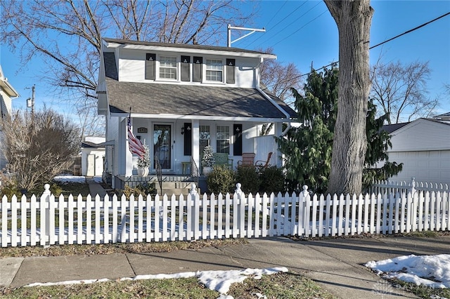 front facade featuring a porch and a garage