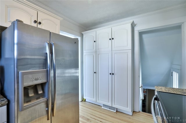 kitchen with crown molding, light hardwood / wood-style flooring, stainless steel refrigerator with ice dispenser, a textured ceiling, and white cabinets