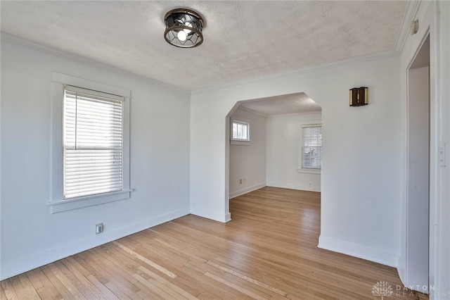 interior space with light hardwood / wood-style floors and a textured ceiling