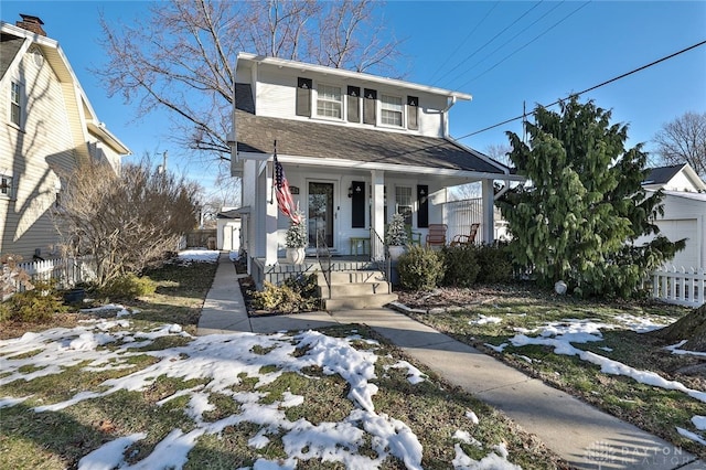 view of front of property featuring covered porch