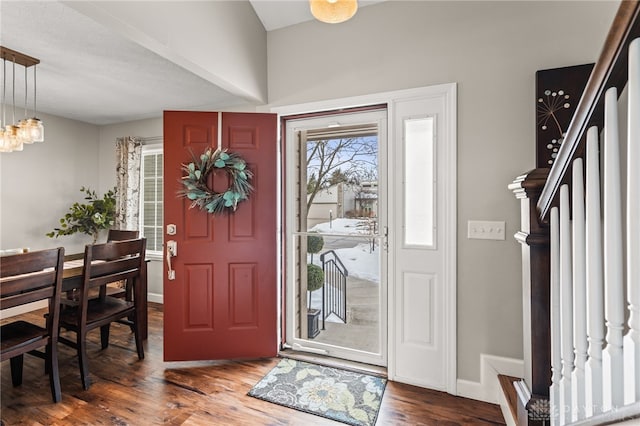 foyer with dark hardwood / wood-style flooring