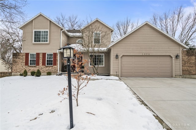 front of property with a garage