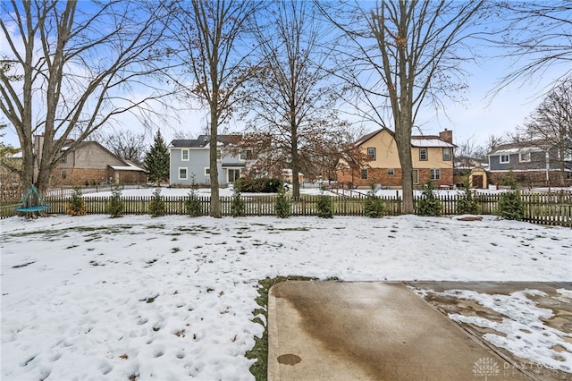 view of yard covered in snow