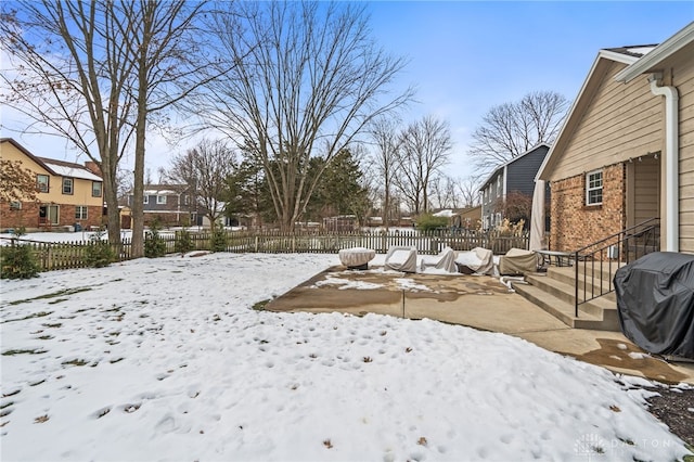 view of yard covered in snow