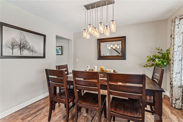 dining room featuring wood-type flooring